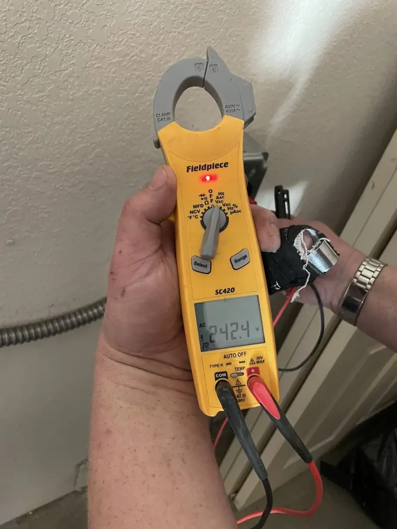 Voltage testing with clamp meter during Generator Installation in Winnetka